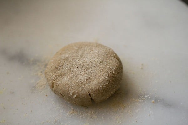 amaranth paratha dough ball on rolling board