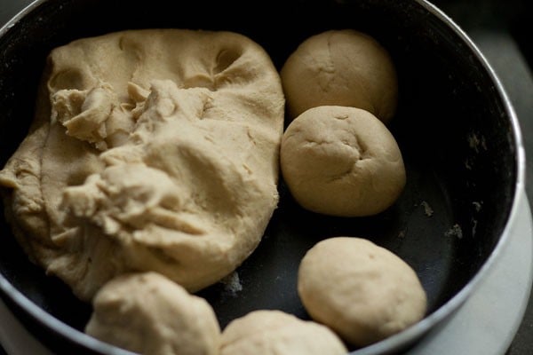 dough balls for making butter roti on the stovetop.