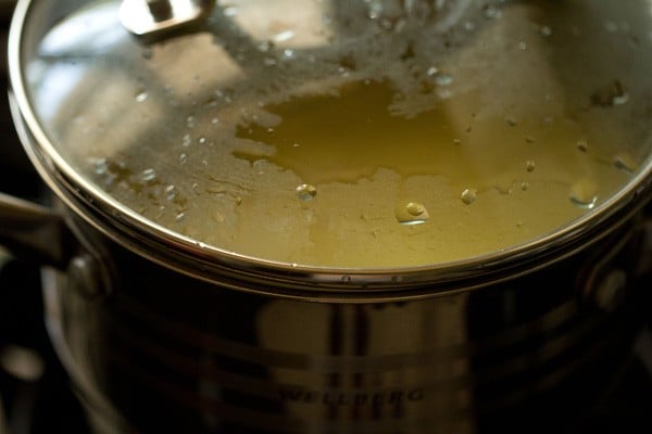 cooking sama rice khichdi in a covered pot