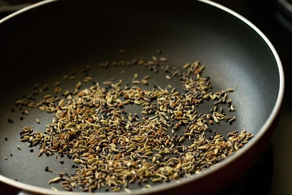 heating and roasting the spices for achari paneer masala recipe