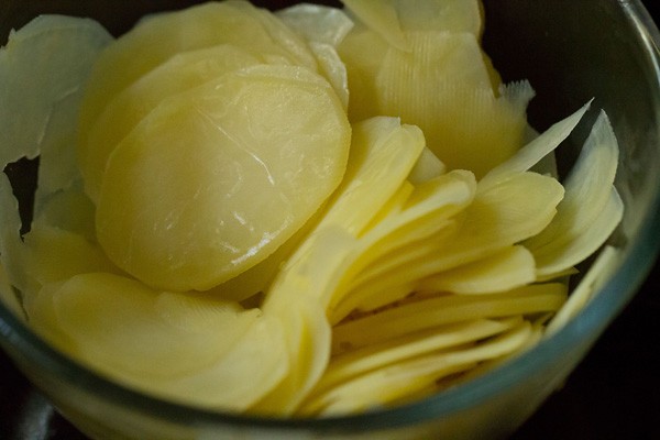 continue tossing until every chip is coated with oil and salt.