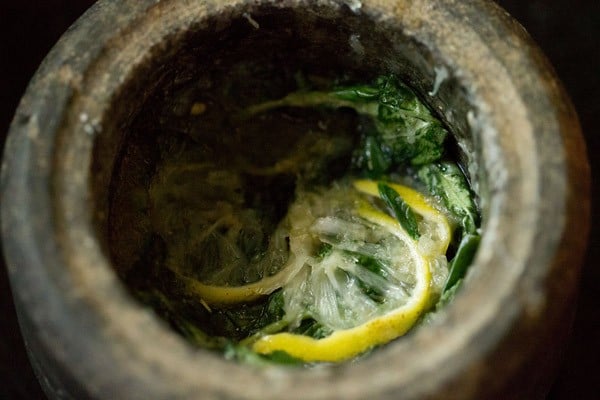 lightly crushing the ingredients in the mortar with a pestle. 