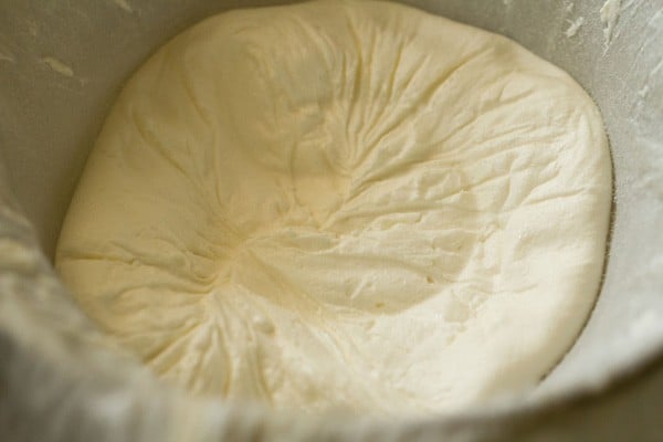 hung curd without whey in a lined sieve