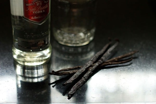 vanilla beans and a bottle of vodka.