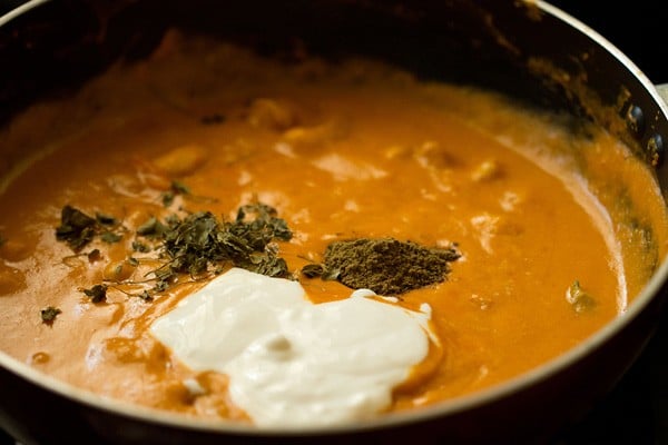 garam masala powder and cream added to kaju curry