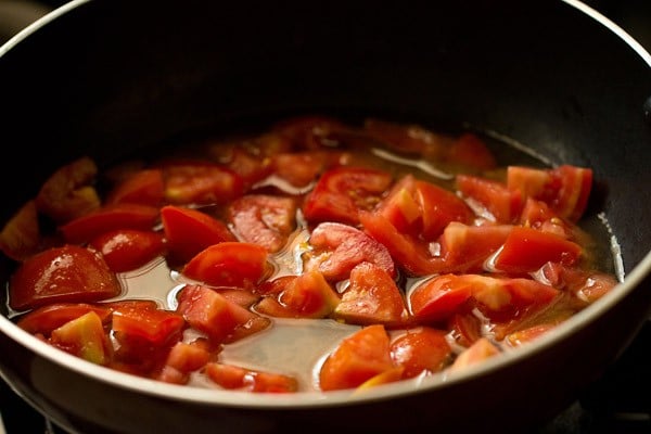 tomatoes added to pan