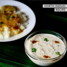 lauki ka raita served in a glass bowl sprinkled with roasted cumin powder and coriander leaves on a dark green board with text layover.