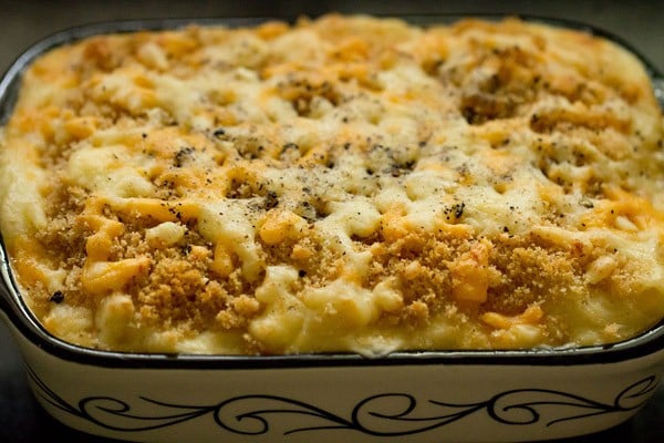 baked mac and cheese is bubbly, golden, and inviting!