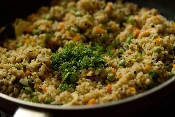 coriander leaves added on oats upma