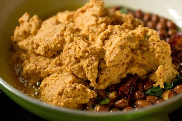 raw mango-coconut-spices paste added in the pan. 