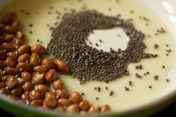 crackling mustard seeds in the pan. 