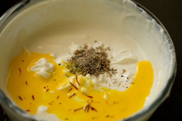 saffron milk and cardamom added to shrikhand recipe