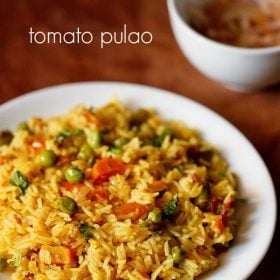 tomato pulao served on a white plate