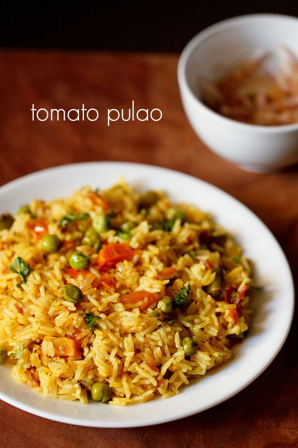 tomato pulao served on a white plate with text layover.