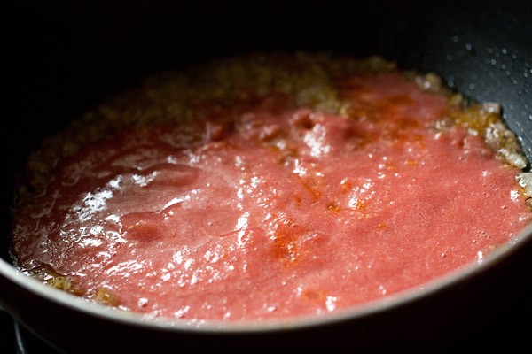 tomato puree in pan