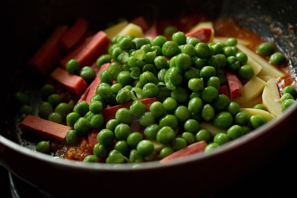 green peas, potato batons, and carrot batons in masala