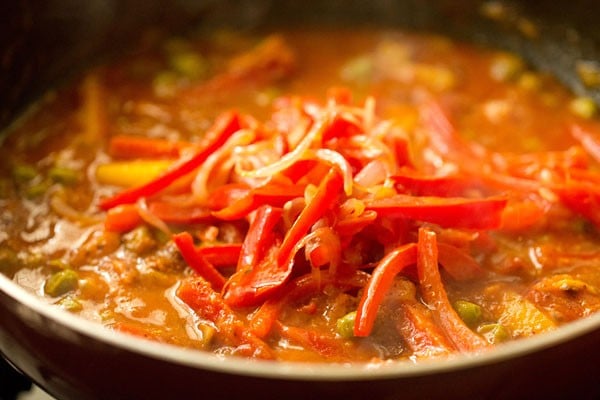 sautéed bell peppers and onions added to veg kadai