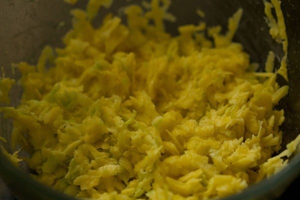 grated raw mangoes in a bowl. 