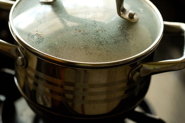 cooking the vegetables for arachuvitta sambar 