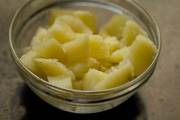 peeled and chopped boiled potato in a bowl. 