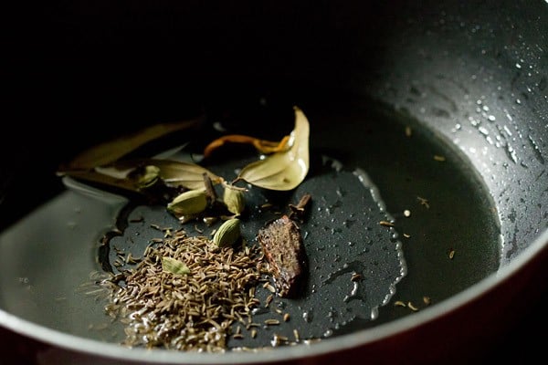 spices for gravy added to pan