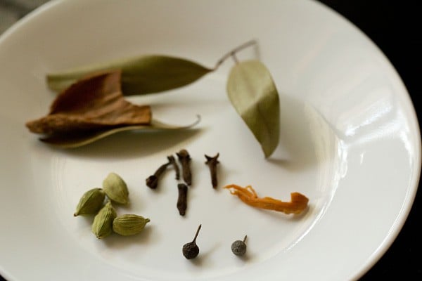 various spices on a white plate