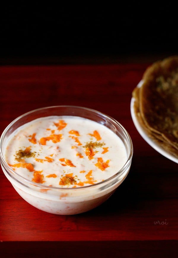 carrot raita served in a bowl