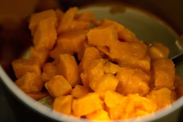 mangoe cubes in a grinder