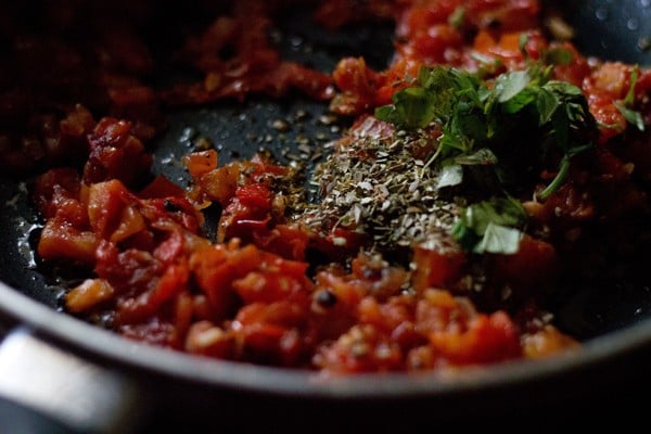 sautéed oregano, chopped fresh basil and tomatoes