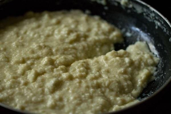 preparing milk cake dough - the batter is holding a line made by the spoon 