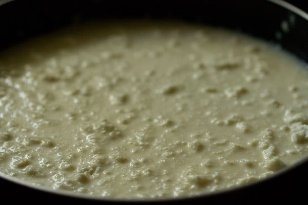 paneer added to pan with condensed milk and mixed