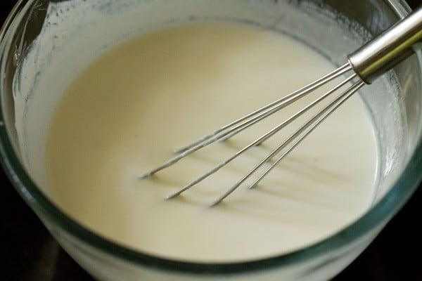 whisking curd