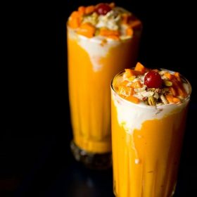 mango mastani served in tall glasses