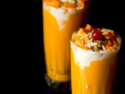 mango mastani served in tall glasses