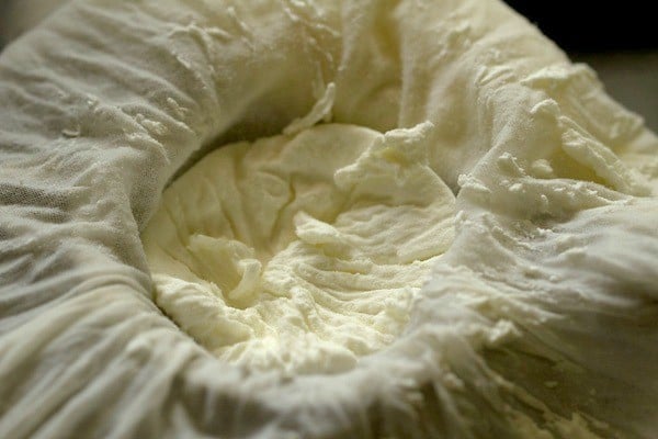 hung curd in a muslin cloth