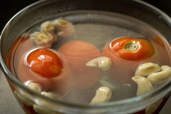 tomatoes and cashews in hot water