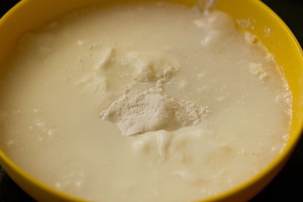 water, fresh curd, rice flour, rava/sooji/cream of wheat/semolina and ground cooking oats in a bowl