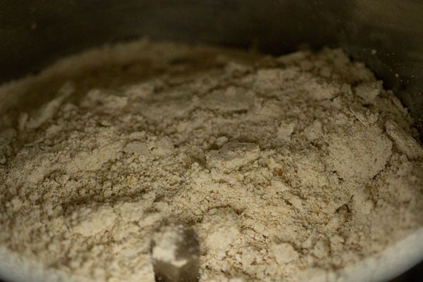 Closeup shot of ground oat flour in bowl.