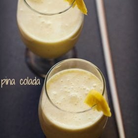 pina colada in stem glasses with text layovers.