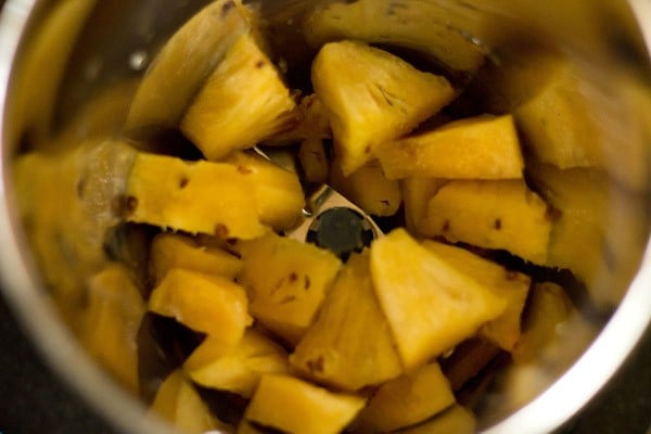 chopped pineapple in blender.