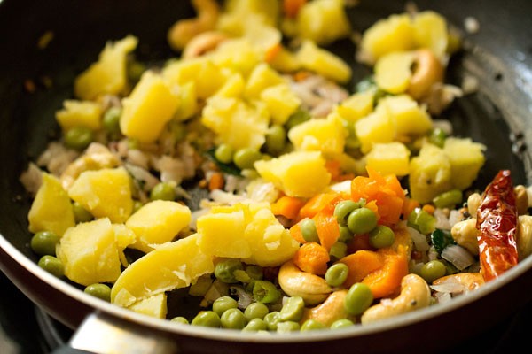 vegetables added to the pan. 