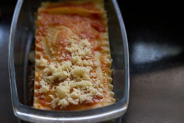 final layer of spinach mushroom lasagna recipe is noodles, red sauce, and cheese.