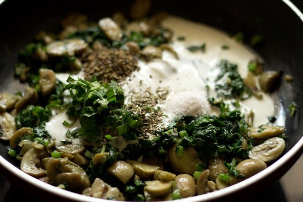 cream and spices added to spinach mushroom mixture.