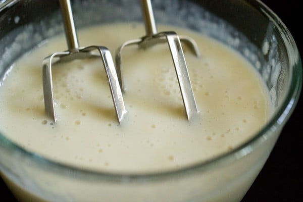 beating custard sauce. 