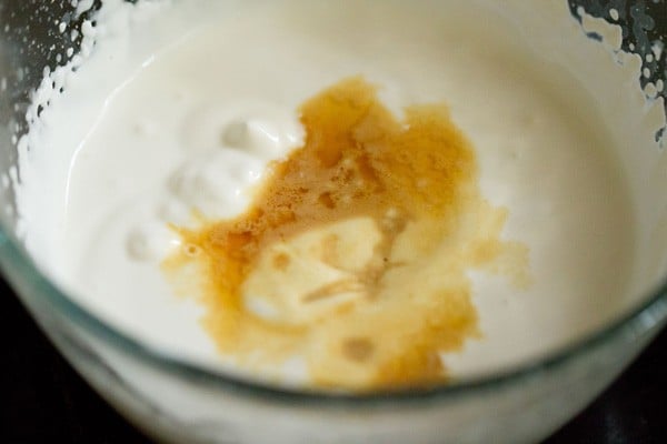 vanilla extract added to whipped cream.