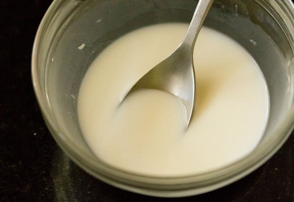 cornstarch and milk mixed to a smooth paste.