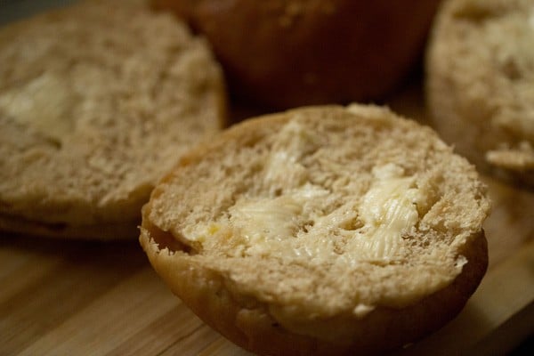 butter spread on halved burger buns