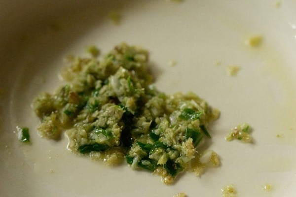 sautéing green chili, garlic, ginger paste in oil