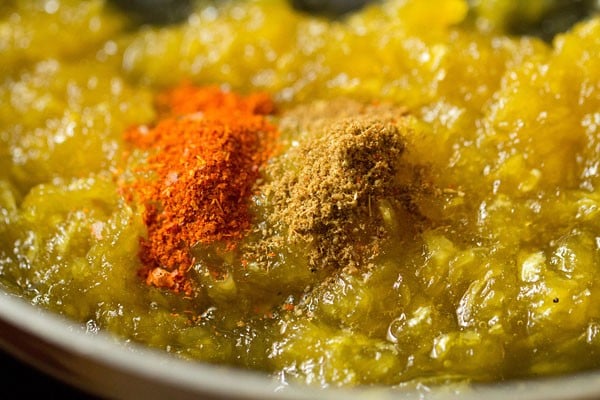 red chili powder and roasted cumin powder added to the cooked mango mixture. 