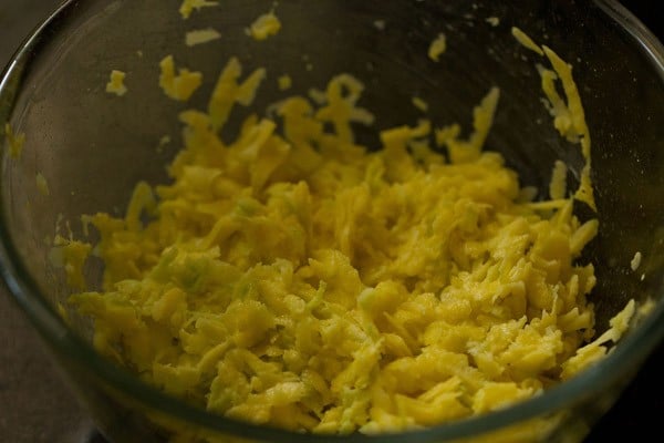 grated raw mangoes in a bowl. 